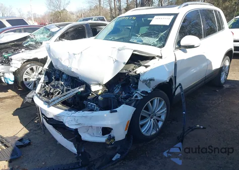 2014 Volkswagen Tiguan Sel from USA, damaged, VIN WVGBV3AX5EW535459